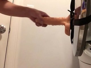 Clothes dryer helps bi guy ride a big dildo