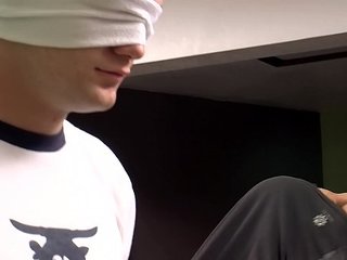 Cocksucker Bryce Corbin blindfolded and pissed on orgy